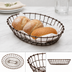 Thumbnail image #3 for American Metalcraft 11 x 8 x 2-1/2 Inch Oval Bronze Wire Serving Basket