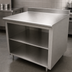 Thumbnail image #3 for Advance Tabco 120-Inch 304 Stainless Steel Work Table with Open Front Cabinet Base, Mid-Shelf, and 5-Inch Backsplash