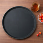 Thumbnail image #2 for New Star Foodservice Inc. 24913 11-Inch Round Black Non-Slip Plastic Serving Tray Case of 12