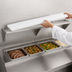 Thumbnail image #4 for Advance Tabco Triumph Supreme Stainless Steel Carving Station Shelf with Removable 3/8-Inch White Poly Cutting Board, 62-7/16 Inches x 12 Inches, For 4-Well Hot & Cold Food Units