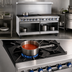 Thumbnail image #4 for Imperial Pro Series 48-Inch Gas Restaurant Range with 6 Open Burners, 12-Inch Griddle, Convection Oven, and Open Cabinet