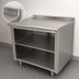 Thumbnail image #4 for Advance Tabco 144-Inch W x 24-Inch D Stainless Steel Work Table with Open Front Cabinet Base, Fixed Mid-Shelf, and 1-1/2-Inch Rear Up-Turn