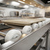 Thumbnail image #3 for Dinex 14-Foot Stainless Steel Skate Wheel Tray Make-Up Conveyor