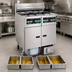 Thumbnail image #4 for Pitco Solstice Reduced Oil Volume Electric Fryer System with 2 Fryers, 4 Tanks, and Built-In Filter Drawer