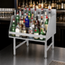 Thumbnail image #5 for Advance Tabco Special Value Series Freestanding 5-Step Stainless Steel Liquor Bottle Display Unit with 4-Inch Backsplash, 30-Bottle Capacity