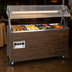 Thumbnail image #4 for Vollrath 2-Series Affordable Portable 4-Well Mobile Hot Food Station with Lighted Buffet Breath Guard and Sliding Door Storage Base, Cherry Woodgrain