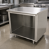 Thumbnail image #4 for Advance Tabco 48 Inch x 30 Inch Work Table with Open Front Cabinet Base and 304 Stainless Steel Top