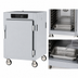 Thumbnail image #4 for Metro C5 8 Series Mobile 1/2 Height Pass-Thru Controlled Temperature Holding Cabinet with Solid Doors and Universal Wire Slides