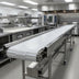 Thumbnail image #3 for Dinex DXIESSB16 16-Foot Slat Belt Motorized Tray Make-Up Conveyor