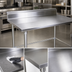 Thumbnail image #4 for John Boos Stallion 108-Inch x 24-Inch Stainless Steel Work Table with 5-Inch Backsplash and Galvanized Base