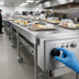 Thumbnail image #3 for Dinex DXIESB20 20 Foot Dual Band Belt Tray Make-Up Conveyor