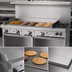 Thumbnail image #4 for Garland G Starfire Pro 60-Inch Commercial Gas Range with 2 Open Burners, 48-Inch Griddle, and 2 Storage Bases