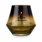 Thumbnail image #1 for Sterno 80550 Round Amber Glass Candle Lamp, 4"H x 4" Diameter, for Liquid Wax or Flameless Rechargeable Candles