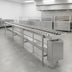 Thumbnail image #4 for Dinex DXIESSW20 20-Foot Non-Powered Stainless Steel Skate Wheel Tray Make-Up Conveyor