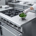 Thumbnail image #4 for Titan JTRH-24B-12WT-36 Heavy Duty Gas Range with 24 Inch Charbroiler, 12 Inch Work Top, and Standard Oven