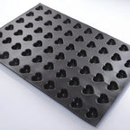 Thumbnail image #1 for JB Prince Demarle M378 M Silicone Fluted Heart Mold, 60 Compartments, 23-5/8" x 15-3/4", Black