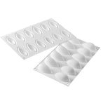 Thumbnail image #1 for Matfer Bourgeat Silikomart 258313 Silicone 3D Quenelle Mold, 12-Cavity, 11-3/4" x 7", White