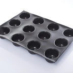 Thumbnail image #1 for JB Prince Demarle M378 K 24-Cavity Cylinder Silicone Baking Mold, 2-1/2" Diameter x 1-3/4"H, Black