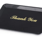 Thumbnail image #1 for New Star Foodservice Inc. 23800 Plastic Tip Tray / Check Bill Holder, 6-1/2" x 4-1/2", Black, Thank You Gold Imprint Case of 12 Dozen