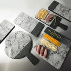Thumbnail image #2 for G.E.T. Horizon Slate - EGS M12RWSM-BH Melamine Round Serving Board, 12" Diameter, 5" Handle, Black Slate/Faux Marble Case of 6