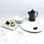 Thumbnail image #2 for G.E.T. Viva - EGS D2213L-W Oval Coupe Melamine Plate, White with Black Trim, 13 x 10-1/8 Case of 6