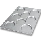Thumbnail image #1 for Chicago Metallic Bakeware 71300 Egg/Hamburger Bun Pan, 8-Cavity, 4-1/4" Round, 13 x 18 x 1/2", Aluminized Steel Case of 6