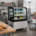 Thumbnail image #2 for Omcan USA RS-CN-0270 Curved Glass Full-Service Refrigerated Bakery Display Case, 9.5 Cu. Ft., Floor Model
