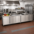 Thumbnail image #2 for John Boos 132-Inch x 24-Inch Stainless Steel Cabinet Base Enclosed Work Table with Flat Top and 3 Hinged Door Sets
