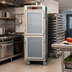 Thumbnail image #2 for Metro C5 6 Series Mobile Full-Height Pass-Thru Heated Holding Cabinet with Dutch Double-Pane Tempered Glass Doors, 34 Pan Capacity, 120V