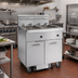 Thumbnail image #2 for Imperial 4-Tank Electric Floor Fryer with Built-In Space Saver Filter System, 75 lb. Capacity per Tank