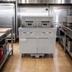 Thumbnail image #2 for 21814EF Dual Open-Pot Electric Fryer Battery with Built-In Filtration, 2 x 60 lb Tanks