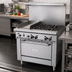 Thumbnail image #2 for Garland GFE Starfire Pro 36-Inch Gas Restaurant Range with 4 Open Burners, 12-Inch Thermostatic Griddle, and Standard Oven