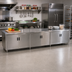 Thumbnail image #2 for Advance Tabco 144-Inch x 24-Inch Enclosed Work Table with Cabinet Base, Mid-Shelf, Hinged Doors, and 14-Gauge 304 Stainless Steel Top