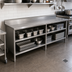 Thumbnail image #2 for 16-Gauge 300-Series Stainless Steel Enclosed Base Work Table with Open Front, 5-Inch Backsplash, and Stallion Safety Edge, 132 x 30 Inches
