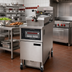 Thumbnail image #2 for Henny Penny PFE-500 Electric 4-Head Commercial Pressure Fryer with Computron 8000 Control and Built-In Filtration