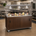 Thumbnail image #2 for 46-Inch Mobile Utility Station with Sliding-Door Storage Base, Buffet Breath Guard and Walnut Woodgrain Finish