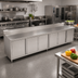Thumbnail image #2 for John Boos 144-Inch x 30-Inch Enclosed Base Work Table with Hinged Doors, 14-Gauge Stainless Steel Top, and 5-Inch Backsplash