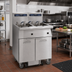 Thumbnail image #2 for Imperial 4-Battery Electric Floor Fryer with Built-In Space Saver Filter System, 75 lb. Tanks, Immersed Elements, and Computer Controls