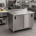 Thumbnail image #2 for Advance Tabco Enclosed Work Table with Cabinet Base and Sliding Doors, 48 x 30 Inches, 14-Gauge 304 Stainless Steel Top, 5-Inch Backsplash