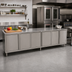 Thumbnail image #2 for John Boos 132-Inch x 36-Inch 16-Gauge Stainless Steel Cabinet Base Work Table with Hinged Doors