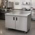 Thumbnail image #2 for Advance Tabco Special Value Series Enclosed Work Table with Sliding Doors, 60 x 30 Inch, 16 Gauge 304 Stainless Steel Top, 5 Inch Backsplash