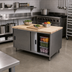 Thumbnail image #2 for BK Resources Dual Access Chef Table with Cabinet Base, Sliding Doors, and 48 x 30 Inch Hard Maple Top
