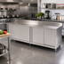 Thumbnail image #2 for John Boos 120-Inch x 30-Inch Stainless Steel Enclosed Work Table with Cabinet Base, Sliding Doors, and 5-Inch Backsplash