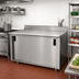 Thumbnail image #2 for Advance Tabco Enclosed Work Table with Cabinet Base and Sliding Doors, 108-Inch W x 36-Inch D, 14-Gauge 304 Stainless Steel Top, 5-Inch Backsplash