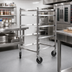 Thumbnail image #2 for Stainless Steel Universal Full-Size Mobile Pan Rack, 5 Slides, 9-Inch Spacing