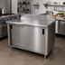 Thumbnail image #2 for Advance Tabco 60-Inch x 30-Inch Enclosed Work Table with Cabinet Base and Sliding Doors, 14-Gauge 304 Stainless Steel Top, 5-Inch Backsplash