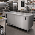 Thumbnail image #2 for Advance Tabco 96 Inch x 24 Inch Cabinet Base Stainless Steel Work Table with Sliding Doors and 14 Gauge 304 Top