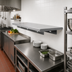 Thumbnail image #2 for Advance Tabco Single Pass-Thru Shelf, 132 Inch W x 24 Inch D, 18/430 Stainless Steel, Wall Mounted