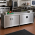 Thumbnail image #2 for Advance Tabco Special Value Economy 120-Inch x 24-Inch Stainless Steel Enclosed Work Table with Cabinet Base, Mid-Shelf and Hinged Doors
