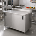 Thumbnail image #2 for Advance Tabco Special Value Economy Cabinet Base Work Table, 96 Inch x 30 Inch, 16 Gauge 304 Stainless Steel Top, Sliding Doors and 5 Inch Backsplash